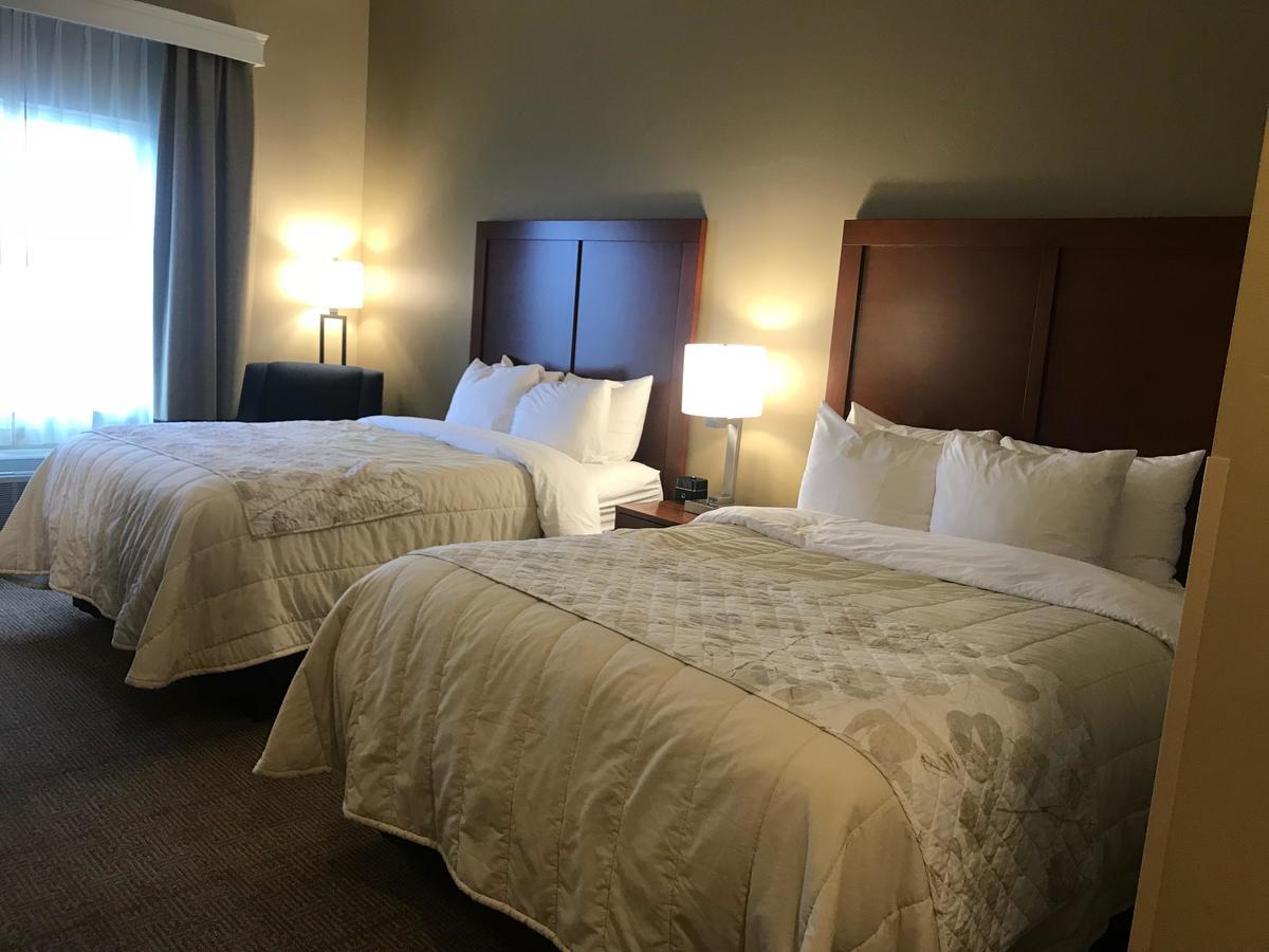 Heartland Inn And Suites Wheatland Экстерьер фото