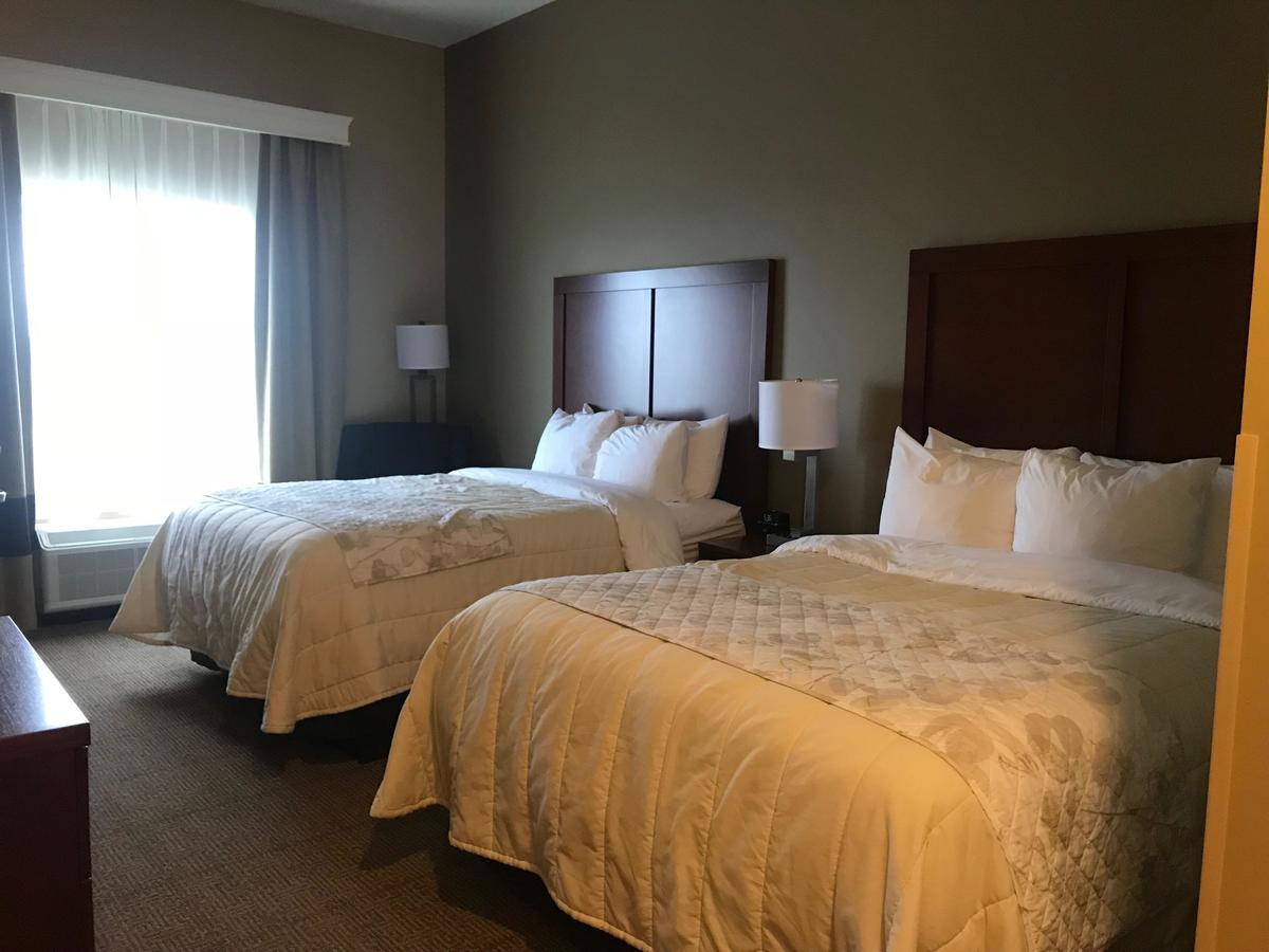 Heartland Inn And Suites Wheatland Экстерьер фото